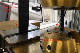 Tensile testing of a fibre-reinforced composite coupon