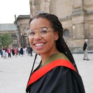 Olivia Sweeney, graduation profile image in front of McEwans Hall