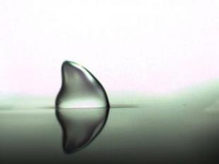 A droplet being moved by SAW (Surface Acoustic Wave) actuation