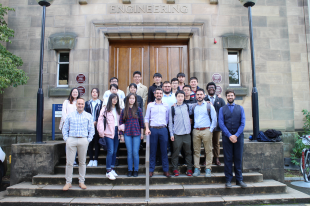 MSc students group photo on the steps of the Sanderson Building
