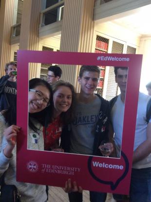 Staff and students pose for group photos with #EdWelcome week selfie frames